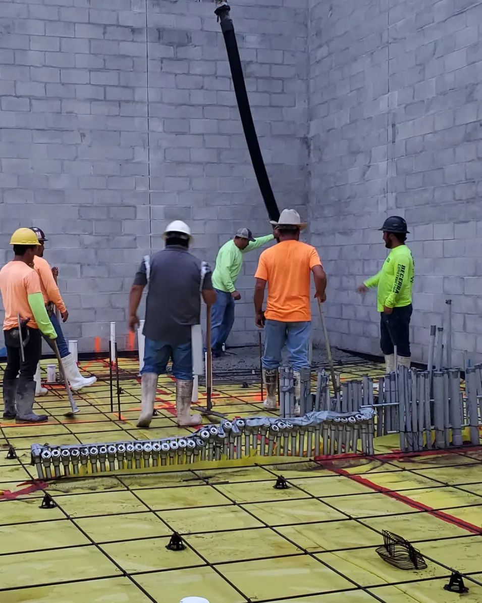 Group of Men working on a commercial concrete pour